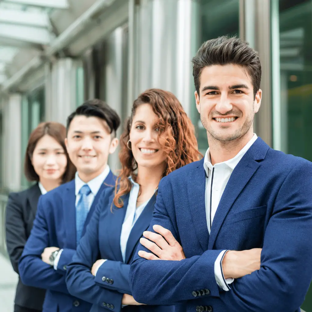 Professional SEO team standing confidently outside a corporate building