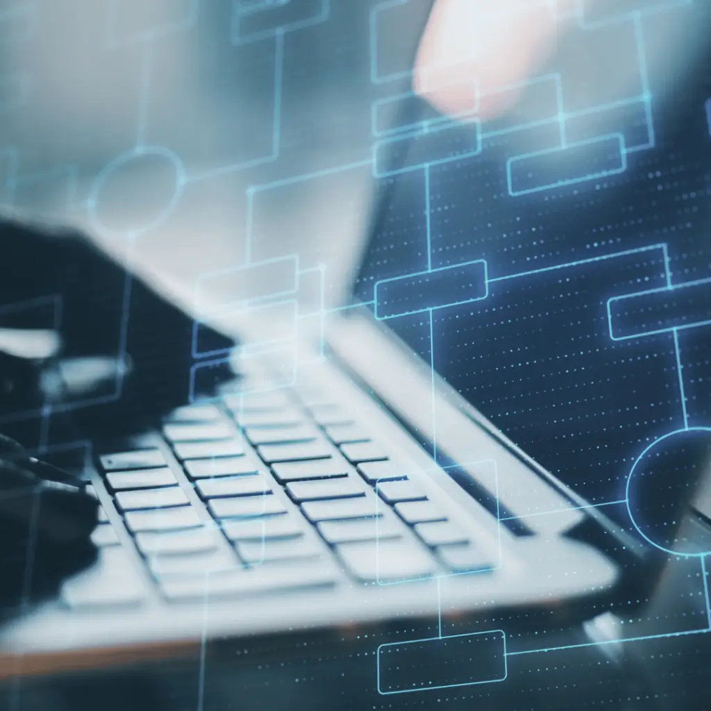 Close-up of hands typing on a laptop overlaid with abstract digital flowcharts representing SEO architecture