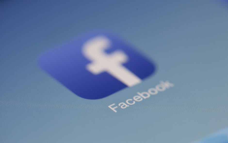 a mobile phone screen showing the facebook logo