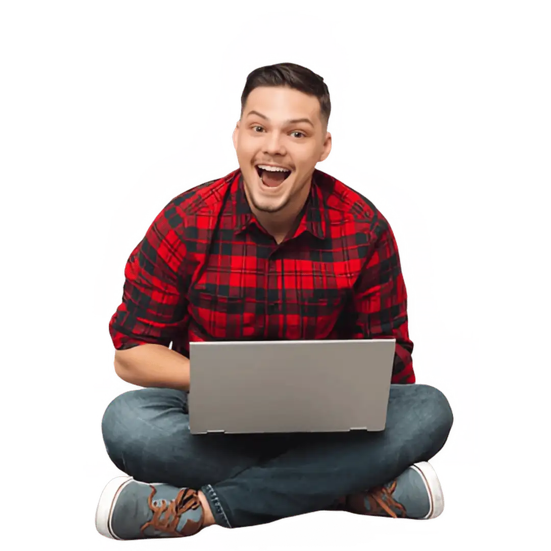 An excited young man sits cross-legged with a laptop on his lap, smiling broadly at the camera. for a successful email marketing campaign.
