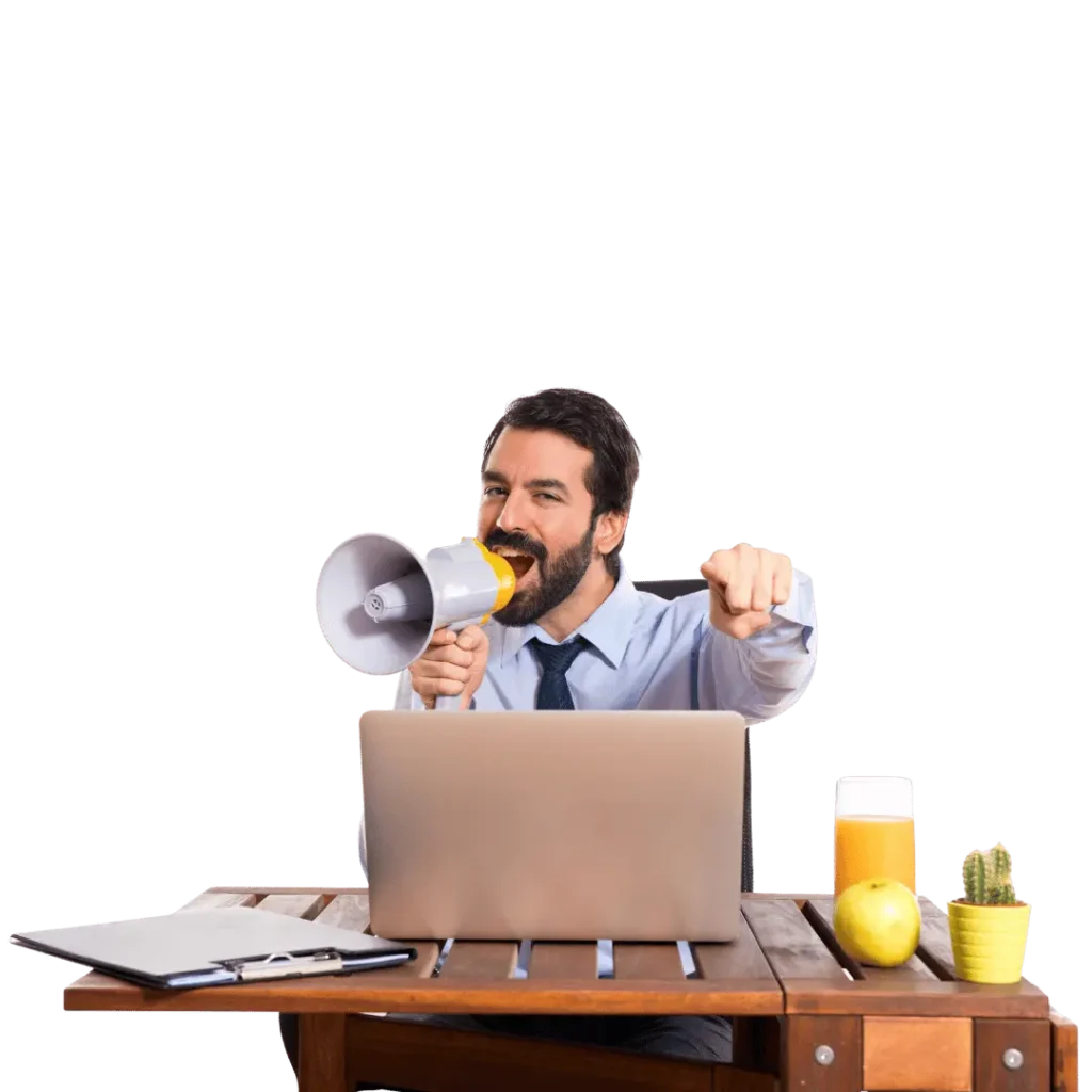 Enthusiastic man shouting into a megaphone while at a laptop, symbolizing powerful Google Ads advertising and wide audience reach
